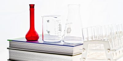Chemistry book and glassware